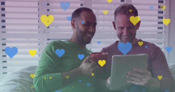 Animation Hearts Diverse Gay Couple Smiling Using Tablet Pride Celebration — Video Stock