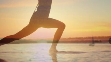 Animation of caucasian woman doing yoga at beach. global sport and fitness concept digitally generated video.