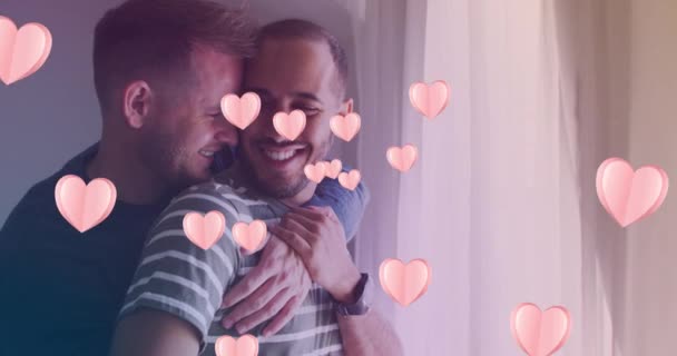 Animation Heart Icons Diverse Gay Couple Embracing Pride Month Celebration — Stock Video