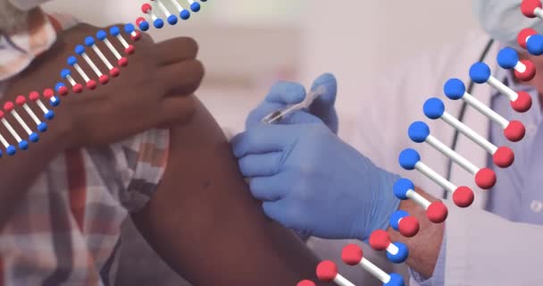 Animation Dna Strands Caucasian Doctor Vaccinating African American Patient Senior — Stock Video