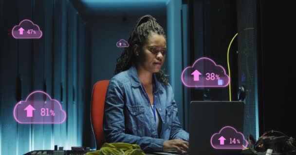 Animation Cloud Uploading African American Woman Working Laptop Server Room — Αρχείο Βίντεο