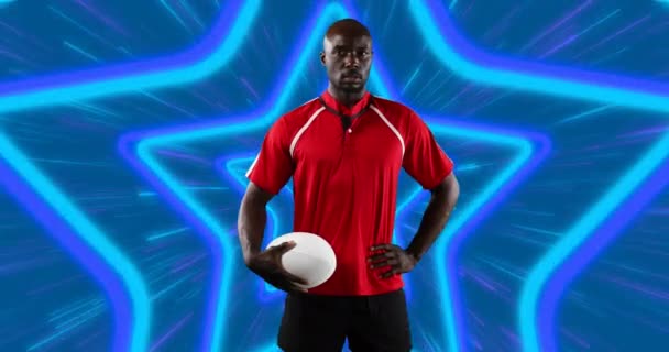 Afrikanischer Männlicher Rugbyspieler Hält Einen Rugbyball Nahtlosem Muster Gegen Neon — Stockvideo