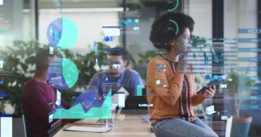 Statistical data processing against thoughtful african american woman using digital tablet at office. business technology concept