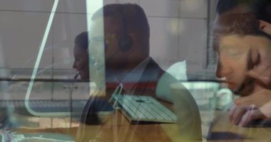 Animation of men using computer over businessmen. global business, success, connections and data processing concept digitally generated video.