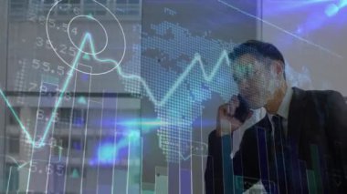 Animation of financial graphs over biracial businessman using smartphone. global business, connections and data processing concept digitally generated video.