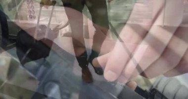 Animation of women using gun over businessmen. global business, success, connections and data processing concept digitally generated video.