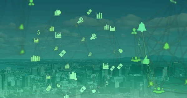 Image of network of connections with icons over cityscape. business, networking, connections, technology and digital interface concept digitally generated image.