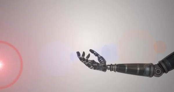 Image of illuminated light bulb over hand of robot arm, with pink light on grey background. electrical engineering technology, communication and research concept digitally generated image.
