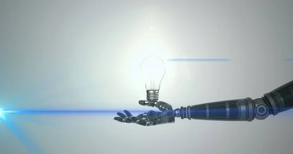 Image of illuminated light bulb over hand of robot arm, with moving blue light on grey. electrical engineering technology, communication and research concept digitally generated image.