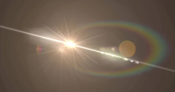 Image of white light with beam and prismatic lens flare on grey background. electricity, light technology, communication and science research concept digitally generated image.