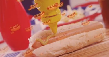 Sosisli sandviçin üzerindeki sosisli ikonlarının animasyonu. Dünya Gıda Günü konsepti dijital olarak üretilen video.