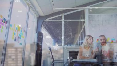 Animation of digital data interface over two caucasian business people. global connection, technology, data processing and digital interface concept digitally generated video.