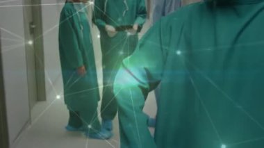 Ameliyathanedeki beyaz cerrahlar üzerindeki bağlantı ağının animasyonu. küresel tıp, covid 19 pandemik konsept sırasında sağlık hizmetleri dijital olarak üretilen video.