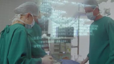 Animation of data processing over caucasian doctors during surgery. global medicine and digital interface concept digitally generated video.