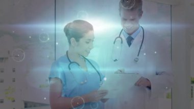 Network of connections over caucasian male doctor and female health worker discussing reports. Medical healthcare and technology concept