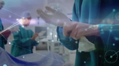 Ameliyathanede iki beyaz cerrah arasındaki bağlantı ağının animasyonu. küresel tıp, covid 19 pandemik konsept sırasında sağlık hizmetleri dijital olarak üretilen video.