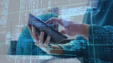 Animation of data processing over caucasian male surgeon using tablet. global medicine and digital interface concept digitally generated video.