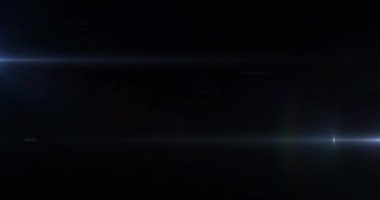 Siyah arkaplanda hareket eden ışıkların animasyonu. renk, model ve hareket konsepti dijital olarak oluşturulmuş video.