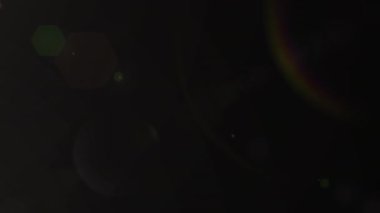 Kahverengi arka planda yanıp sönen ışığın animasyonu. renk, hareket ve enerji konsepti dijital olarak oluşturulmuş video.