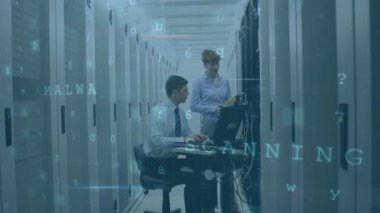 Animation of cyber attack warning over caucasian people in server room. global internet security, connections and data processing concept digitally generated video.