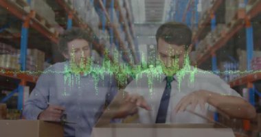 Animation of financial graphs and data over caucasian male warehouse workers. Business, finance and delivery services concept digitally generated video.