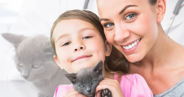 Multiple image of cute black kitten and portrait of caucasian mother and daughter holding kitten. Love, friendship, together, childhood, international cat day, pet, animal, protection and awareness.