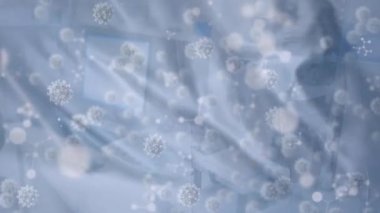 Ofiste virüs hücrelerinin ve şekillerin canlandırılması. covid 19 pandemik kavramı dijital olarak oluşturulan video sırasında küresel iş ve dijital arayüz.