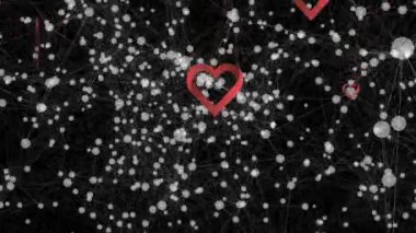 Siyah arkaplanda yüzen kalplerin animasyonu. aşk, ilişki, renk ve hareket konsepti dijital olarak oluşturulmuş video.