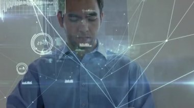 Network of connections and data processing against caucasian man using digital tablet. global networking and business technology concept