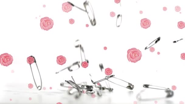 在白色的背景上 玫瑰在安全的别针上飘扬 飘落在白色表面的洒落物上的叶子的动画 — 图库视频影像