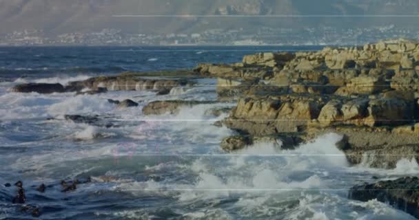 岩に当たる海の波に対する統計的データ処理 コンピュータ インターフェース技術と自然概念 — ストック動画