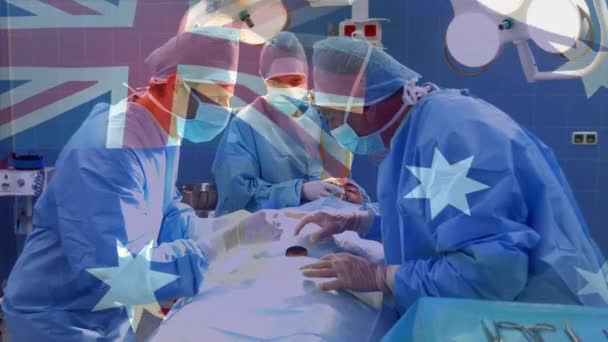 Animación Bandera Australia Sobre Diversos Médicos Durante Cirugía Concepto Medicina — Vídeo de stock
