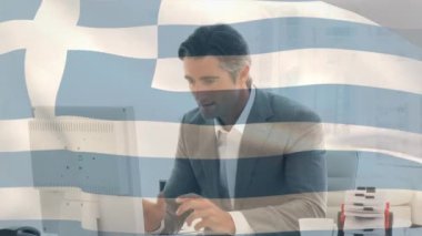 Waving greece flag against caucasian senior businessman celebrating at office. world relations and business concept