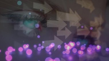 Purple glowing spots of light and multiple arrow icons against close up of female eyes. Biometric scanning and technology concept