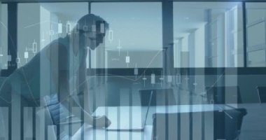 Statistical data processing over caucasian businesswoman using laptop at office. Business data and analytics technology concept