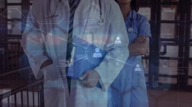 Mutlu kadın ve erkek doktorlar üzerindeki bağlantı ağının animasyonu. sağlık, tıp, bağlantılar ve teknoloji konsepti dijital olarak oluşturulmuş video.