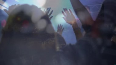 Animation on blurred night road traffic over caucasian male singer and people hands on concert. Music, entertainment and night city life concept digitally generated video.