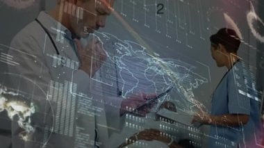 Data processing against thoughtful caucasian senior male doctor using digital tablet at hospital. Medical healthcare and technology concept