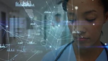 Animation of data processing over african american female nurse. Global medicine and digital interface concept digitally generated video.