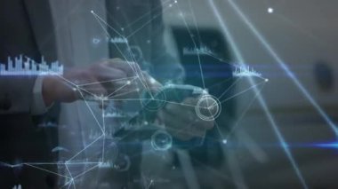 Animation of data processing over caucasian businessman using smartphone. Global business and digital interface concept digitally generated video.