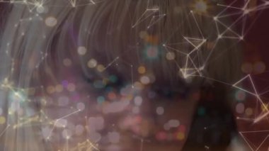 Animation of network of connections and light spots over caucasian woman using make-up brush. Global connections and digital interface concept digitally generated video.