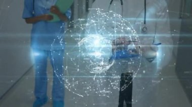Çeşitli kadın ve erkek doktorlar üzerinde dünya ile bağlantı ağının animasyonu. Sağlık, tıp, ağ, bağlantılar ve teknoloji konsepti dijital olarak oluşturulmuş video.