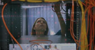 Animation of financial data processing over female caucasian server room worker. global business, finance and connections concept digitally generated video.