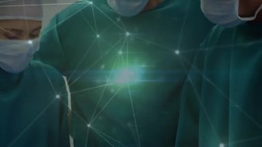 Ameliyat sırasında çeşitli cerrahlar üzerindeki bağlantı ağının animasyonu. küresel tıp ve dijital arayüz kavramı dijital olarak üretilen video.