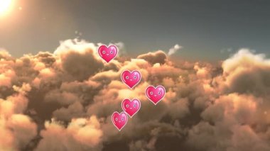 Animation of happy hearts floating over clouds. love, relationship and valentines concept digitally generated video.