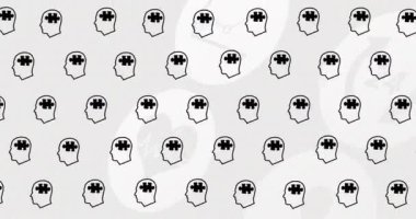 Tıbbi simgelerin üzerinde yapboz parçaları olan kafa animasyonu. Dünya alzheimer ayı ve dijital olarak üretilen video konsepti.