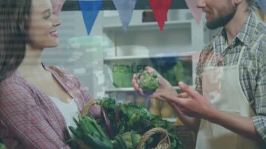 Finansal grafiklerin, marketteki mutlu beyaz erkek satıcı ve kadın müşteri üzerine animasyonu. ekonomi, finans, alışveriş ve dijital olarak üretilen küçük bağımsız iş konsepti.