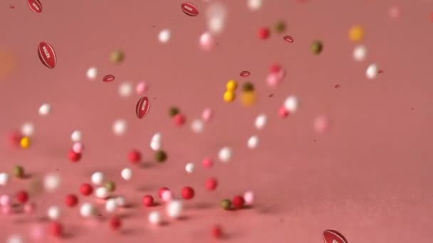 Animace Koulí Padající Přes Postřikovače Růžovém Pozadí Animace Listů Objevujících — Stock video
