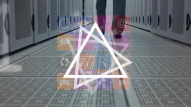 Animation of shapes and icons over worker in server room. global technology and digital interface concept digitally generated video.