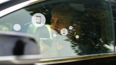 Animation of network of connections over caucasian man using smartphone in car. network, connections, communication, transport and travel concept digitally generated video.